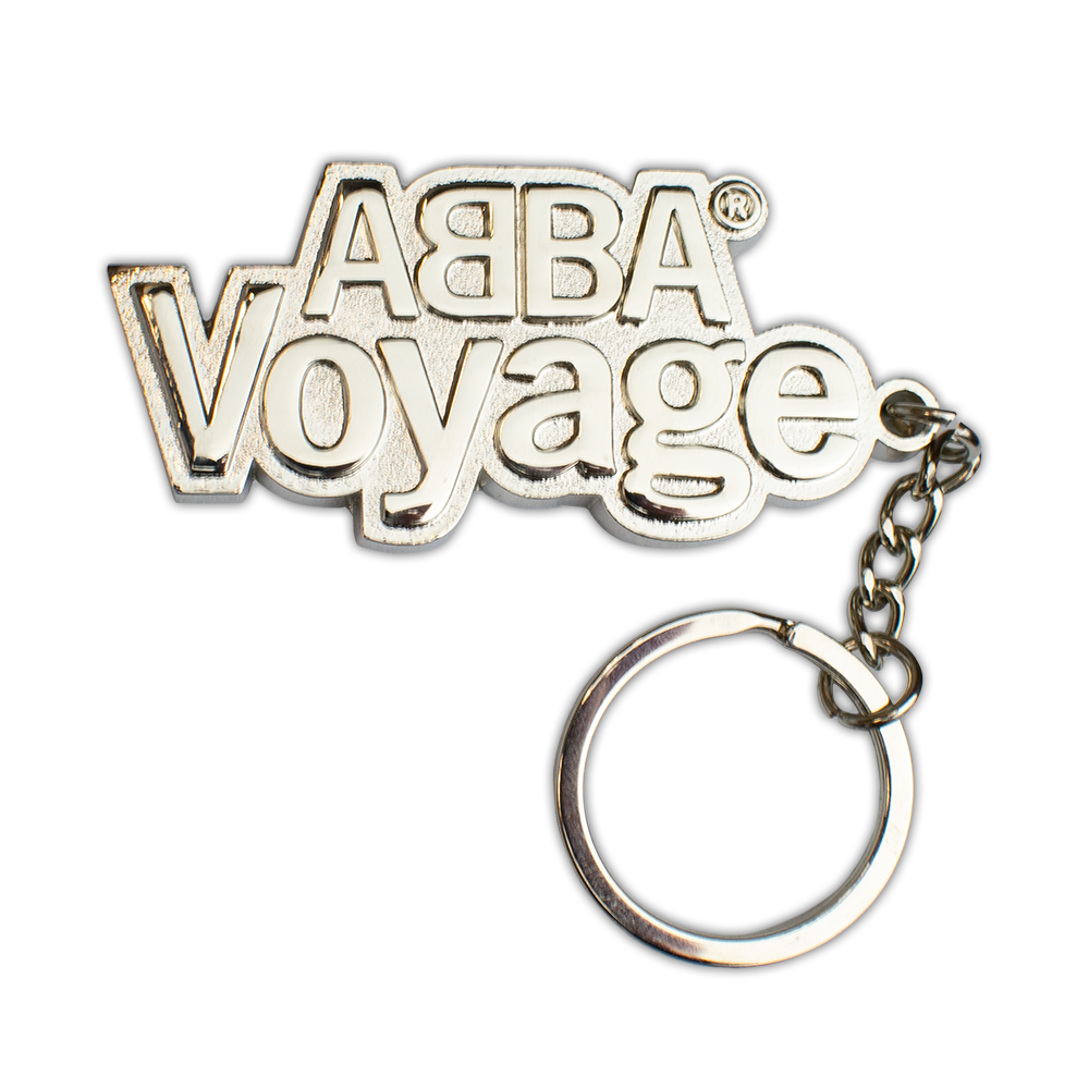 Silver-colored keychain with ABBA Voyage in raised lettering for ABBA Voyage travel gift set