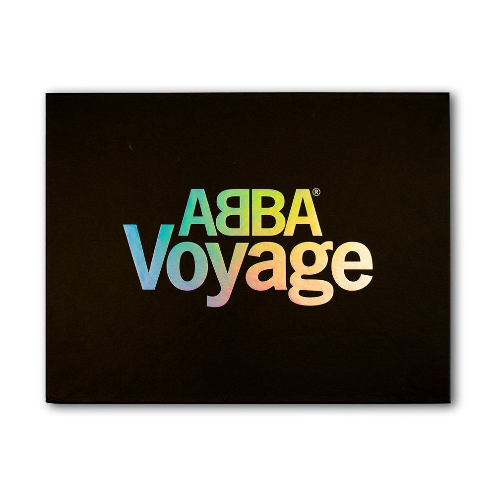 Album cover for ABBA Voyage highlights vibrant text on black for Voyage Travel gift set